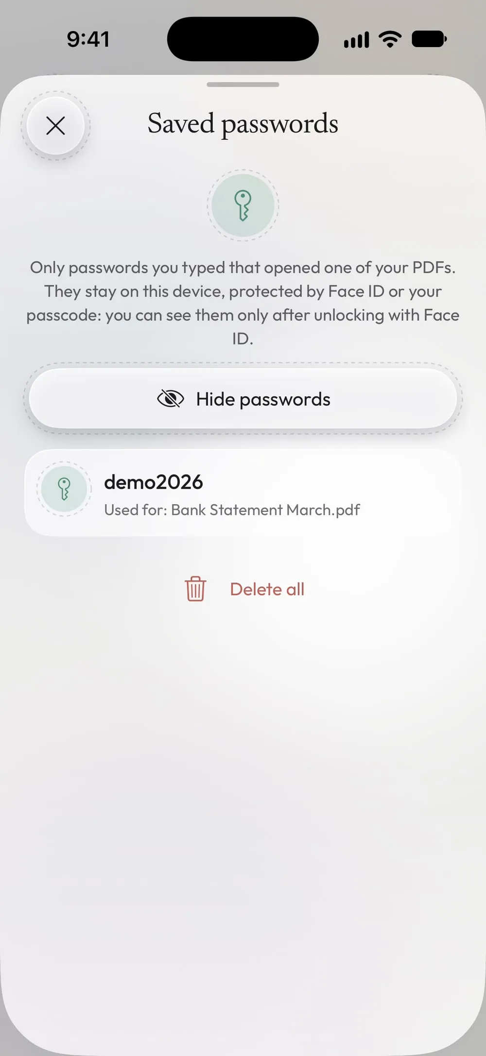 Saved passwords in Settings, shown after Face ID, with the PDF each one opened